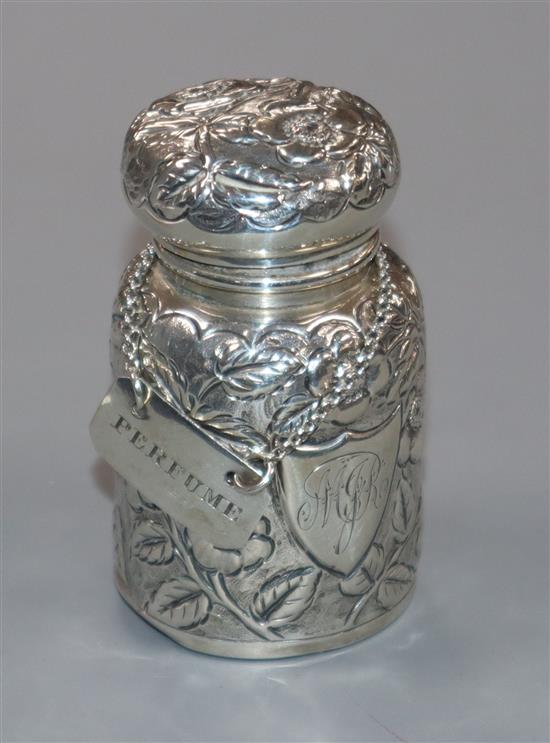 A Victorian embossed silver perfume bottle, Arthur Wilmore Pennington, Birmingham, 1891 and an earlier silver label.